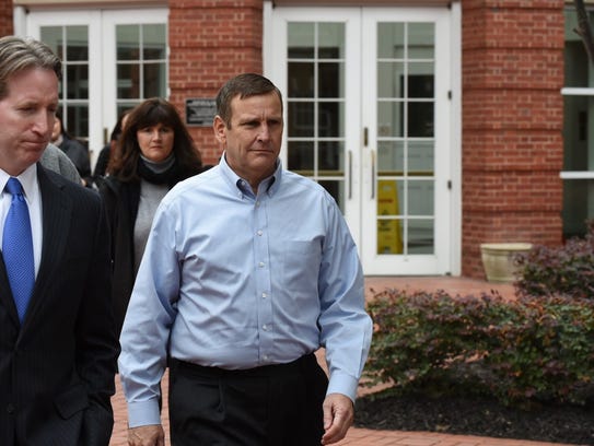 Scott Wombold, right, former vice president of direct