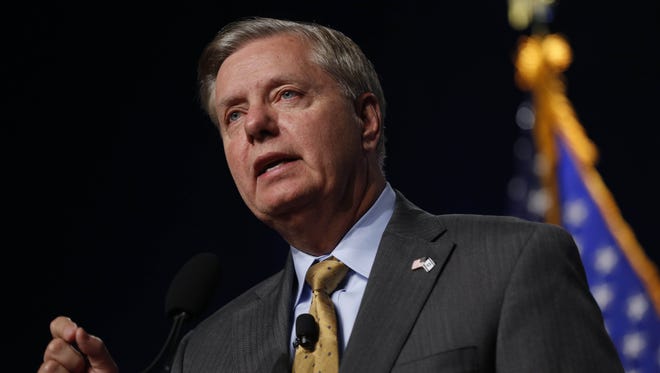 Republican presidential candidate Lindsey Graham speaks Saturday, Sept. 19, 2015 during the Faith & Freedom Coalition fall dinner at the Paul Knapp Center in Des Moines.