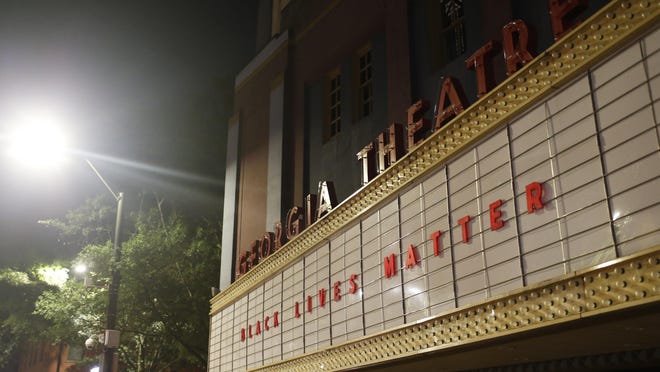 In a show of support for the Black Lives Matter protests around the country the marquis of the iconic Georgia Theater shows its support in Athens, Ga, on Friday, June 5, 2020. The night marked the first weekend in over three months with the downtown bars open due to the novel coronavirus pandemic which continues to spread in the state.