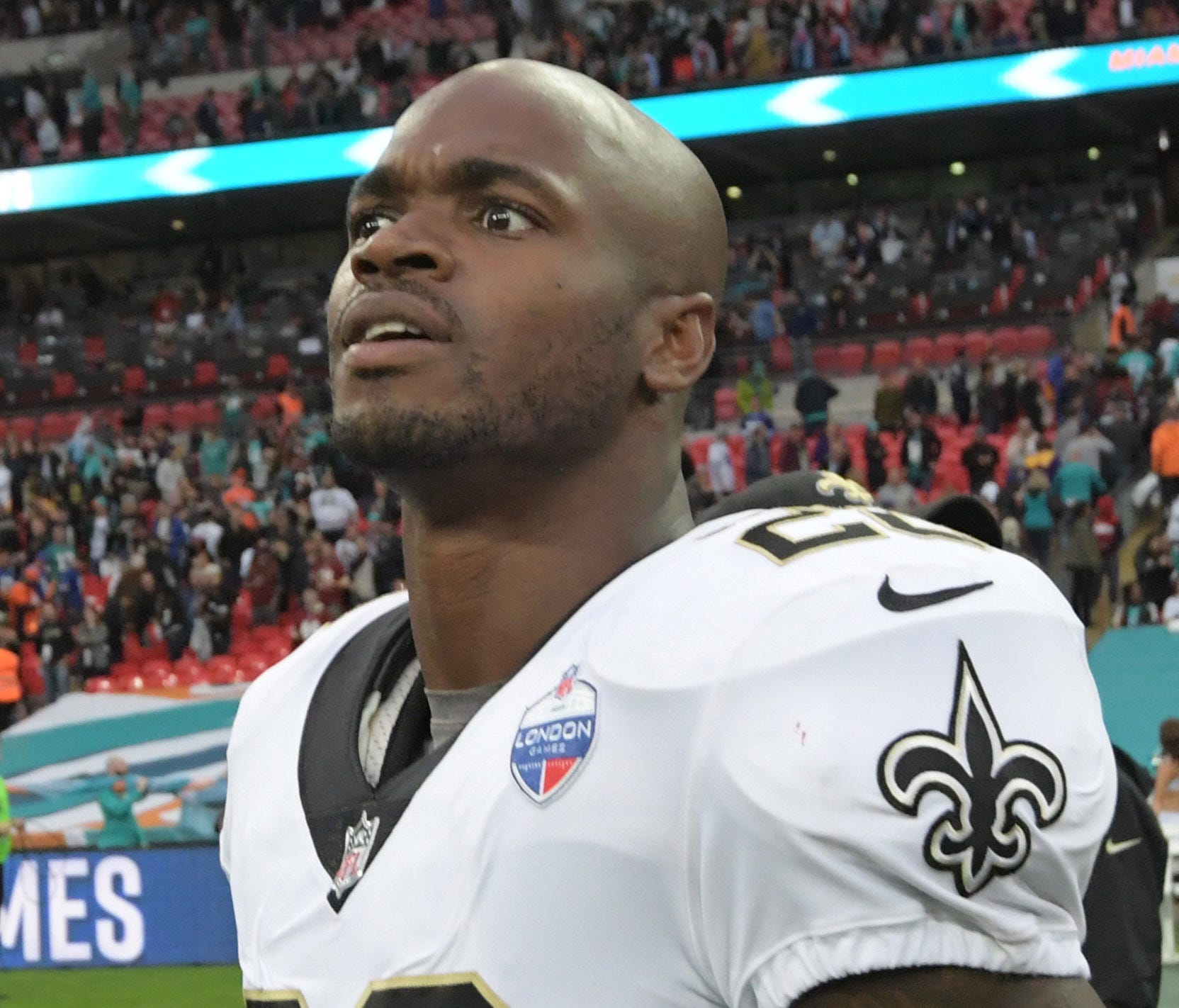 New Orleans Saints running back Adrian Peterson (28) reacts after the NFL International Series game against the Miami Dolphins at Wembley Stadium.