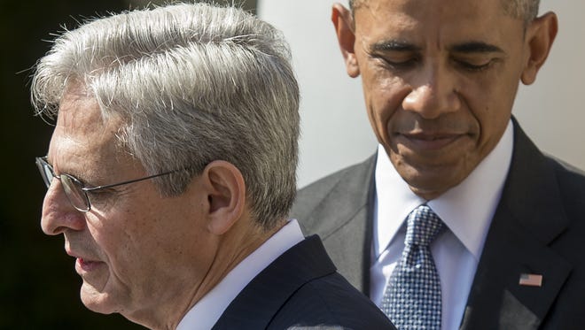 President Obama joins his Supreme Court nominee, federal appeals court judge Merrick Garland, during the nomination announcement the Rose Garden of the White House March 16.