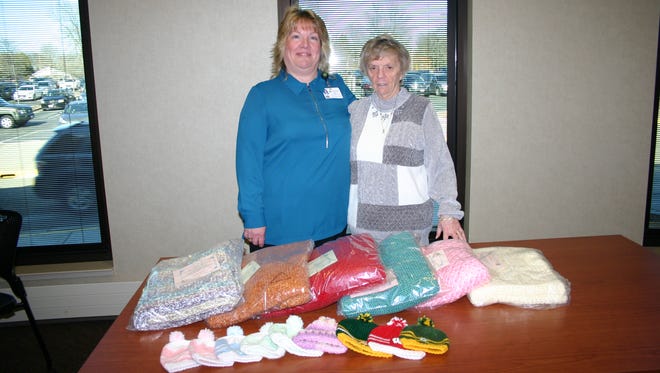Barb Peeters (left) chairs the Baby Cap Committee and Karen Compton (right) co-chairs the Care Shawl Committee at Aspirus Riverview Hospital.