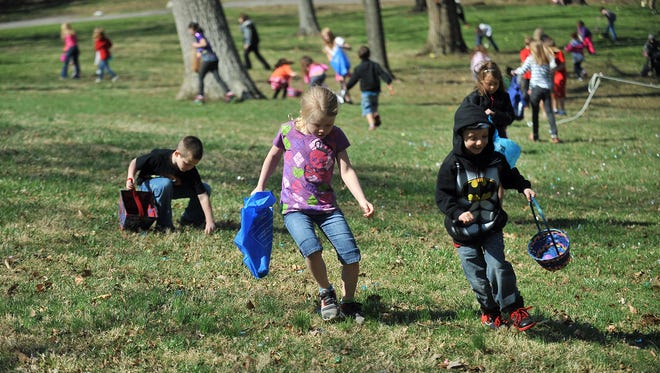 Children take part in an Easter egg hunt.