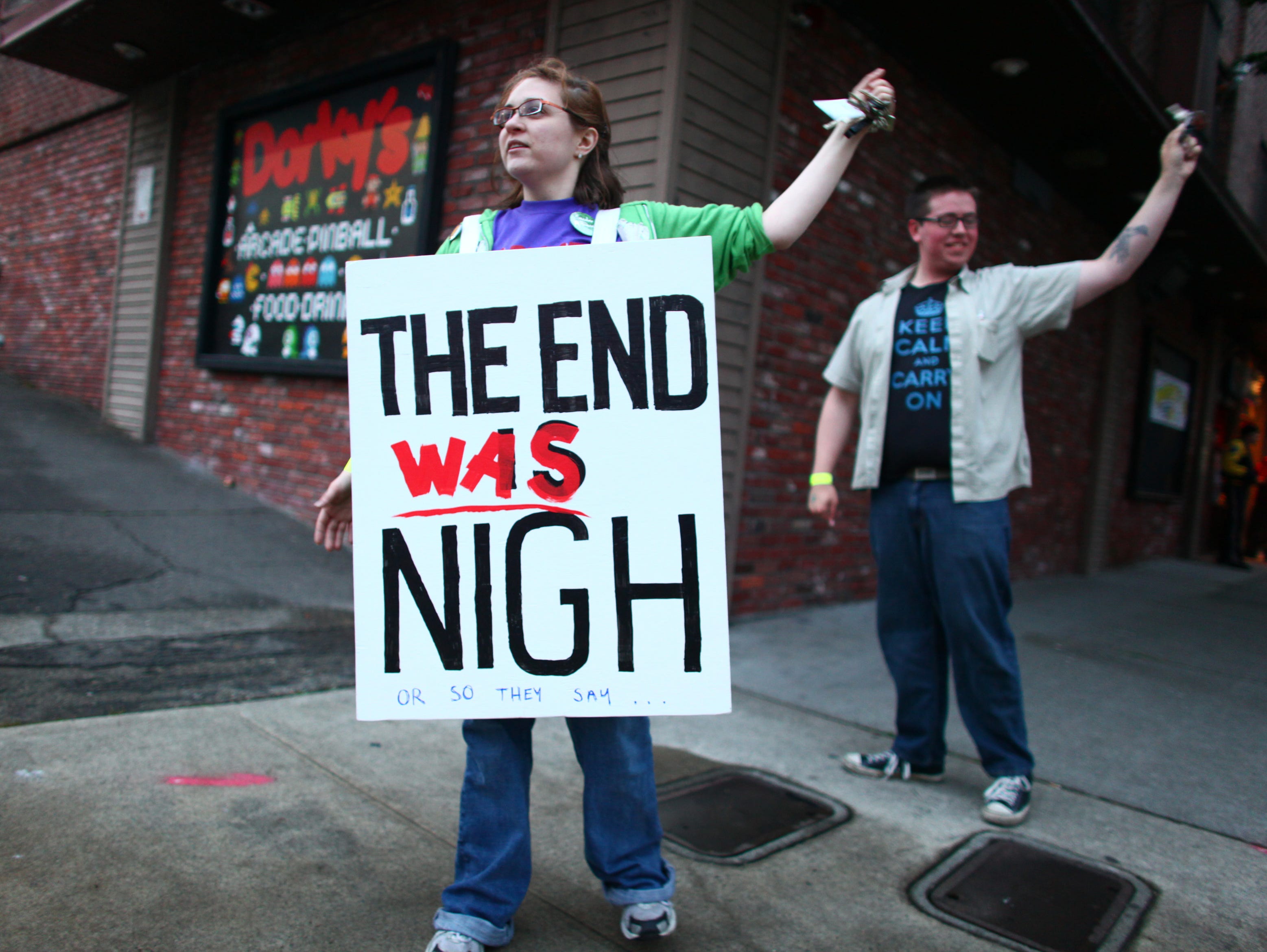 Becky Friedman stands outside a rapture party, May 21, 2011 at Dorky's Arcade in Tacoma, Wash.