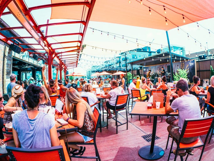 The packed patio area at the Tipsy Crow Tavern.