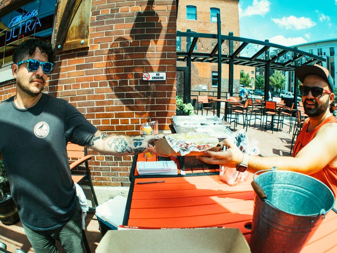 Dale Rinderman, 29, of Des Moines, serving up breakfast