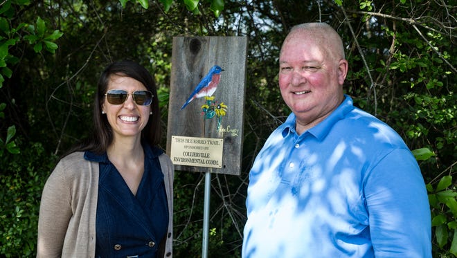 April 20, 2017 - Crystal Warren, left, chair of the Collierville Environmental Commission, and Fred Robertson, right, president of the Shelby County Chapter of the Tennessee Bluebird Society, pose for a portrait near a sign commemorating a new bluebird birdhouse along the bluebird trail at W.C. Johnson Park in Collierville. The Collierville Environmental Commission sponsored the new birdhouse which is the third in Collierville.