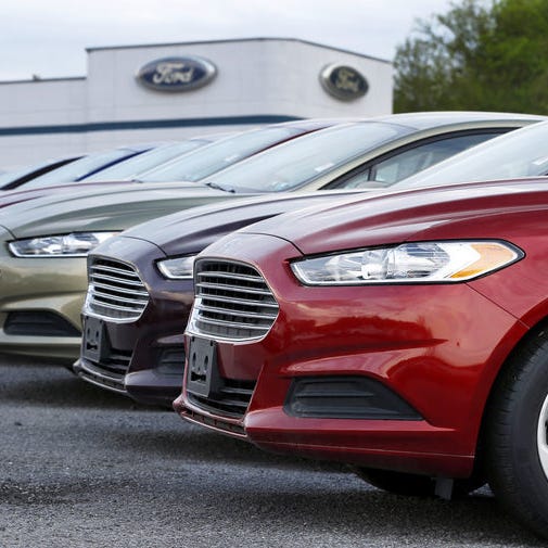 Keith Srakocic | Associated Press2013 Ford Fusions are displayed in May 2013 at an automobile dealership in Zelienople, Pa.