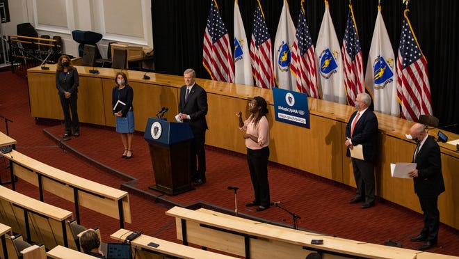 Gov. Charlie Baker, joined by three of his cabinet secretaries and the lieutenant governor, detailed an economic recovery plan Thursday that includes millions of dollars in small business grants.