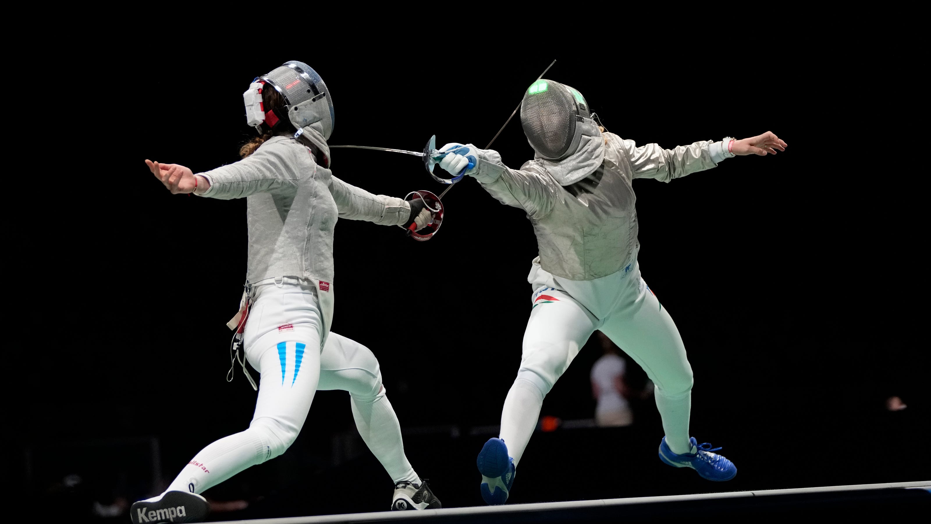 Olympic fencing loss parried by love and marriage proposal