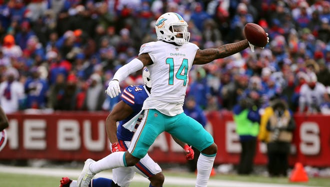 Miami receiver Jarvis Landry makes a one handed catch against the Bills. 