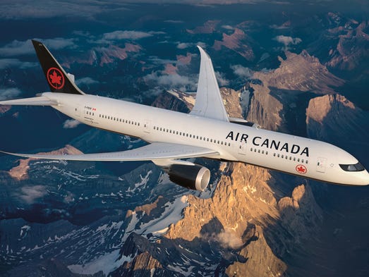 This image released from Air Canada shows its new paint