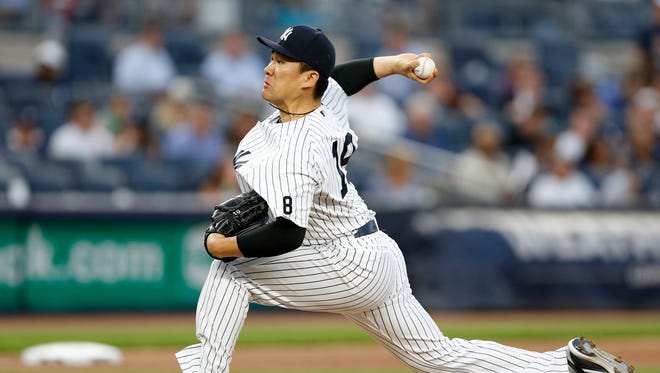 Yankees starting pitcher Masahiro Tanaka works in the second inning against the Los Angeles Angels at Yankee Stadium on Monday, June 6.