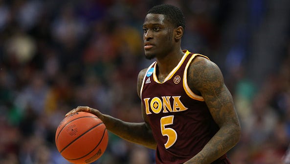 A.J. English of the Iona Gaels drives the ball against the Iowa State Cyclones during the first round of the 2016 NCAA Men's Basketball Tournament at the Pepsi Center on March 17, 2016 in Denver, Colorado.