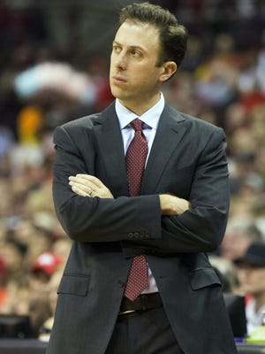 Minnesota Golden Gophers head coach Richard Pitino watches as his team plays the Ohio State Buckeyes.