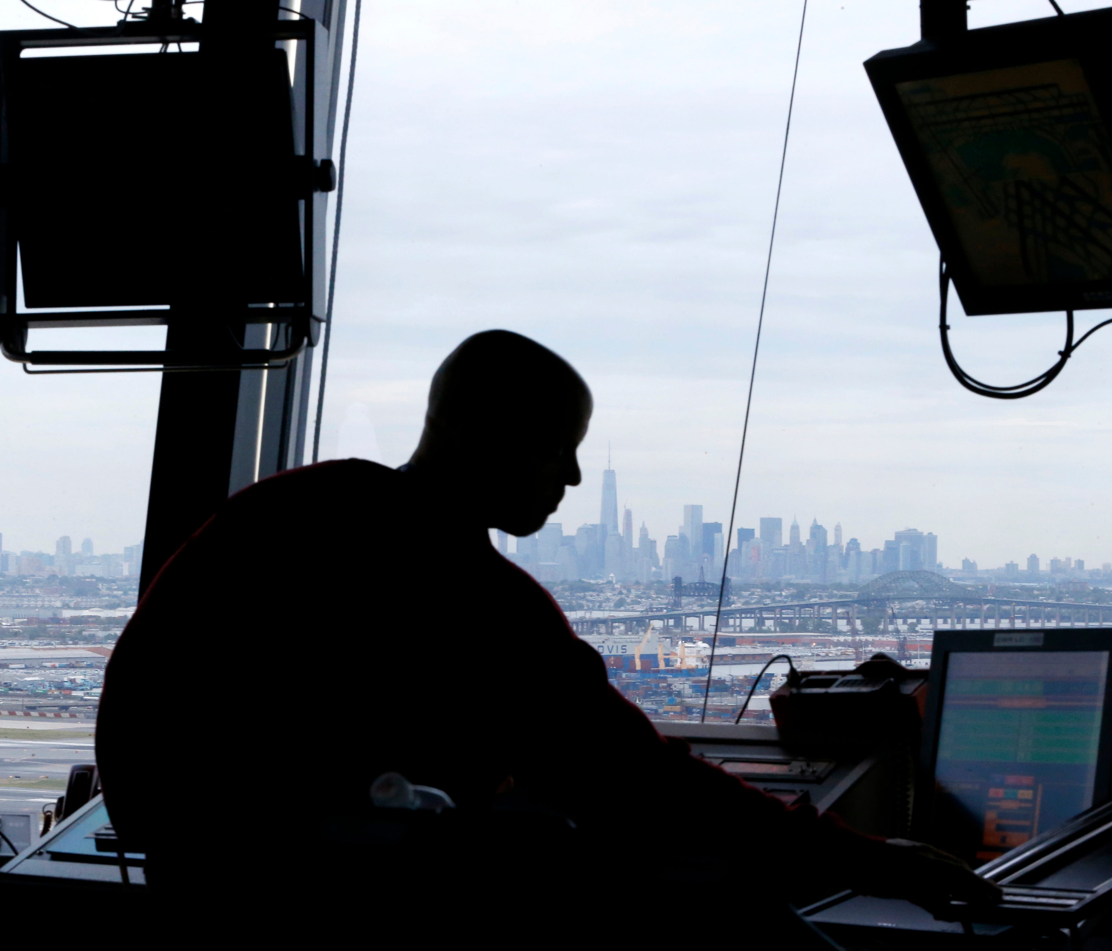 An air traffic controller works in the tower at Newark Liberty International Airport on May 21, 2015.