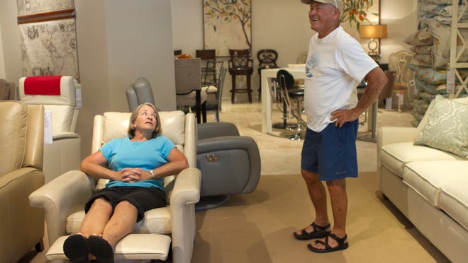 
Karen and Bob Nagy shop for recliners at Robb & Stucky International on Thursday in south Fort Myers.
