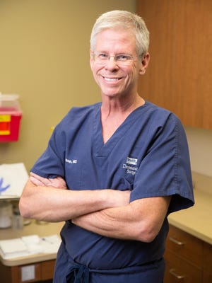 Dr. Larry Bishop is a dermatologist for Health First Medical Group.