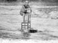 In this 1975 photo, Henry Sheremeta rides a chair balanced
