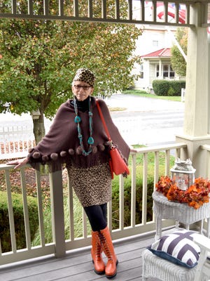 Iris Prager of Milton models several outfits at her home Friday Nov. 6, 2015