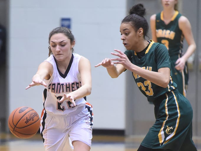 York Catholic's Jania Wright gets the ball stolen from