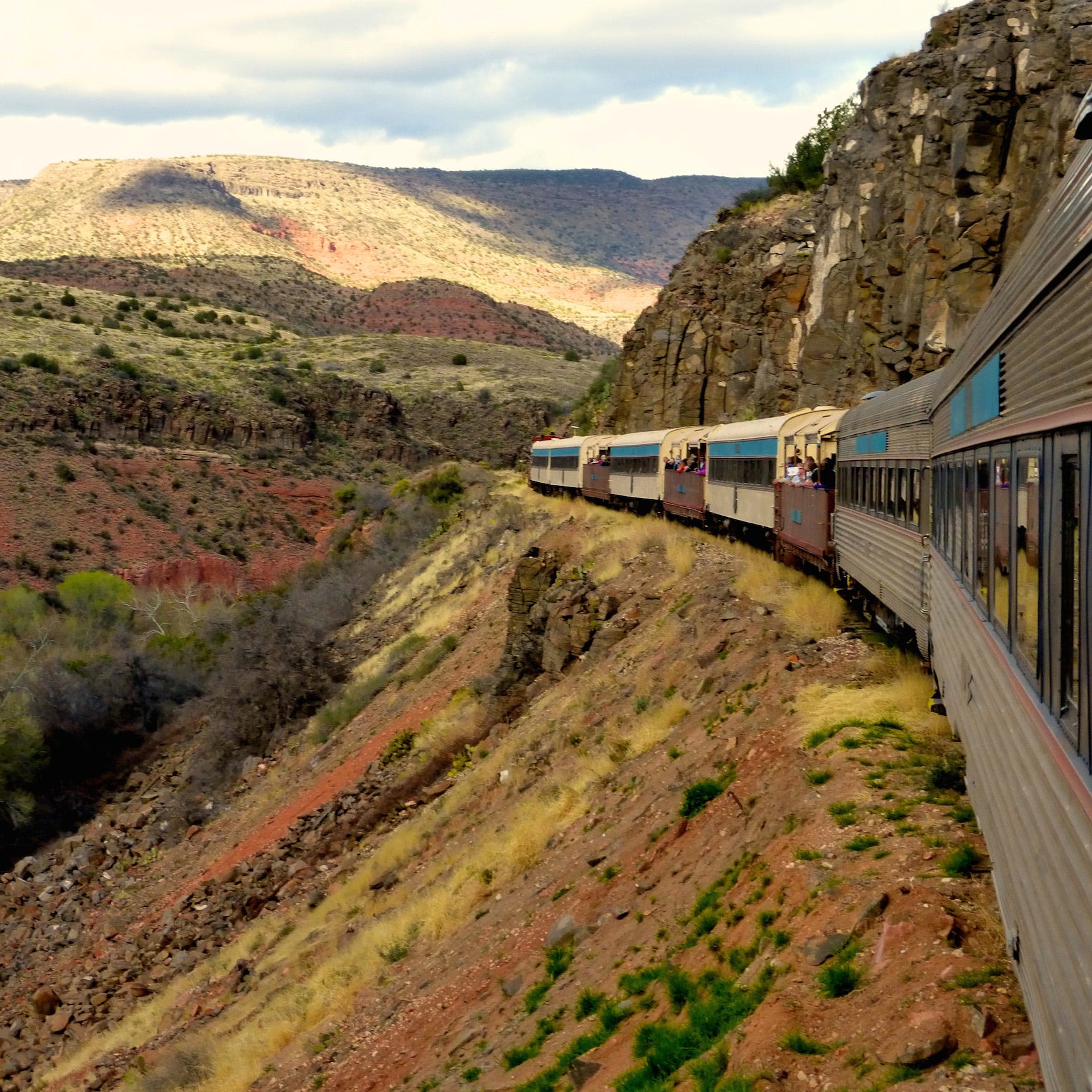 Verde Canyon Railroad rolls through a lush riparian corridor in a high-walled gorge on its four-hour journey.