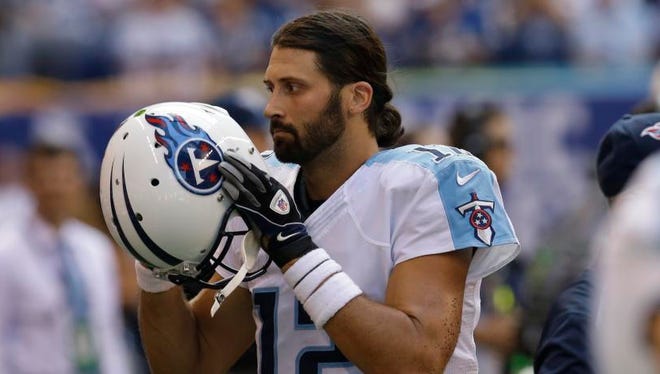 Titans quarterback Charlie Whitehurst readies to return to the field in the second half against the Colts.
