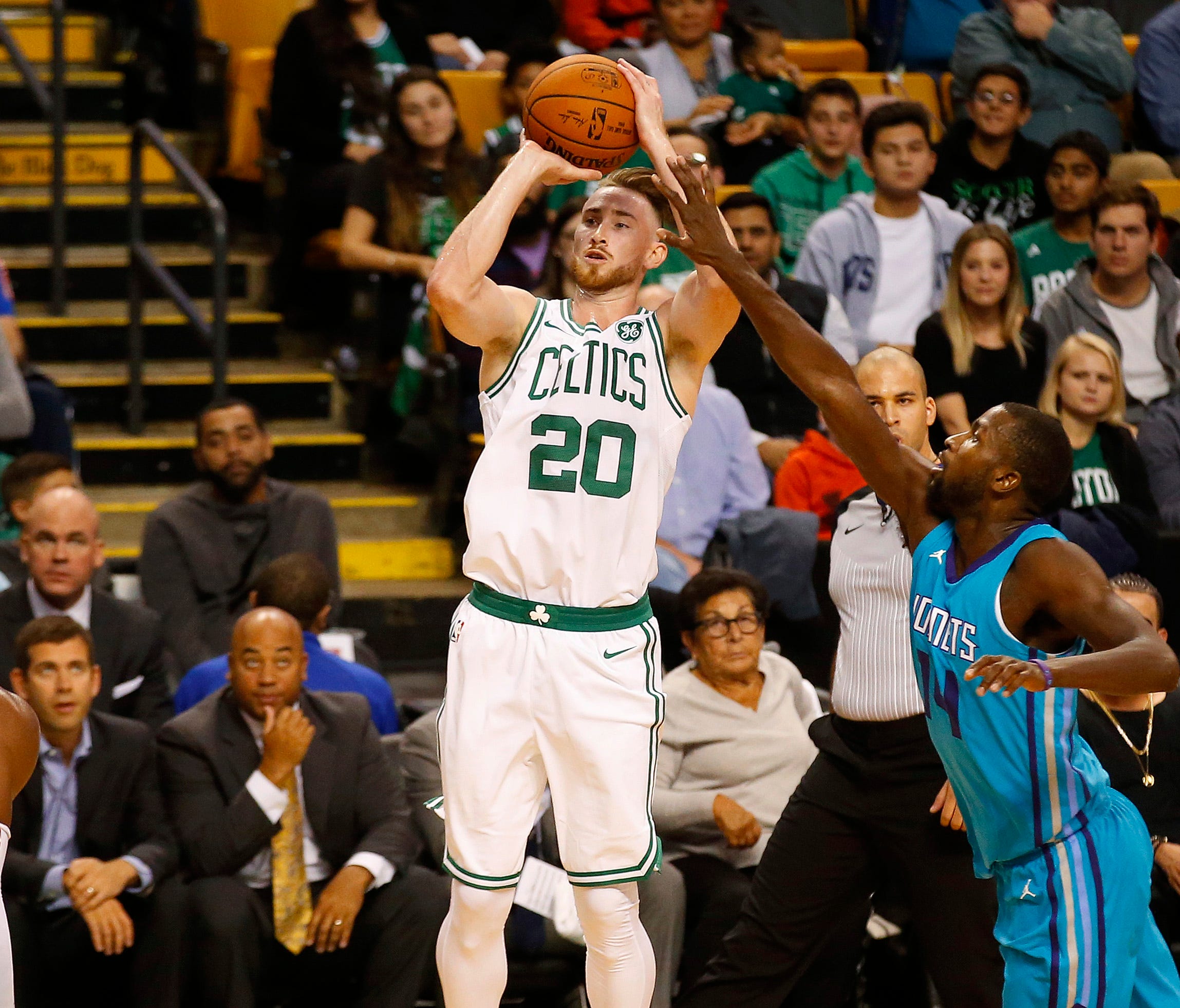 Oct 2, 2017; Boston, MA, USA; Boston Celtics forward Gordon Hayward (20) shoots past Charlotte Hornets forward Michael Kidd-Gilchrist (14) during the first half of a preseason game at TD Garden.