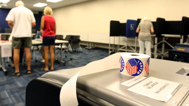 Voters cast their ballots during an election in 2015. The 2018 spring election is scheduled for April 3.