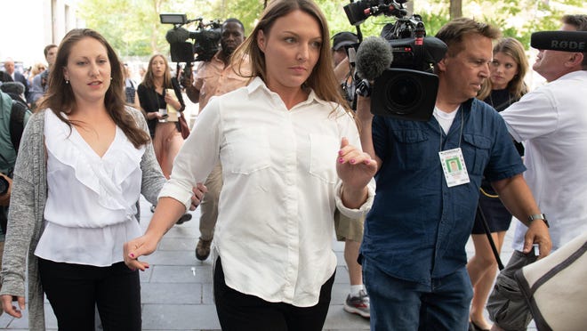 Victims of Jeffrey Epstein, Michelle Licata (left), who went to Royal Palm Beach High School and Courtney Wild (right), who went to Lake Worth Middle School when she was lured by Epstein,  leave the the Manhattan Federal Courthouse in July 2019.