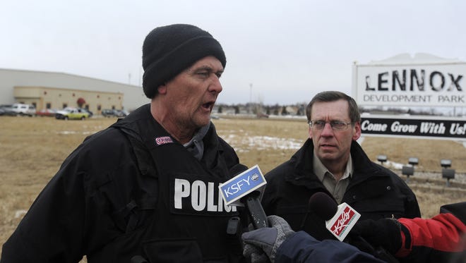 Chief of Police Orville Jorgensen and Lincoln County Sheriff Dennis Johnson talk to the media about the shootings at an industrial park in Lennox, S.D., Thursday, Feb. 12, 2015.