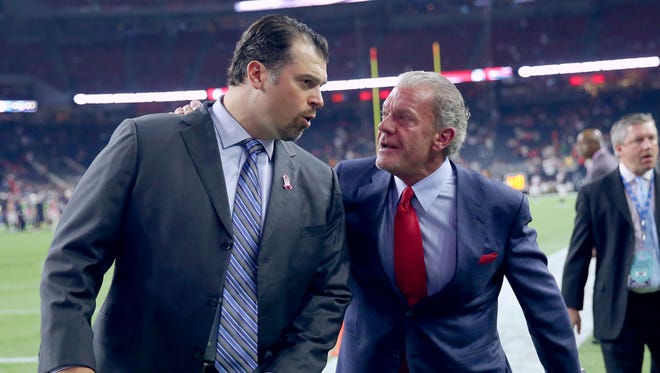 Ryan Grigson, left, general manager for the Indianapolis Colts and team owner and CEO Jim Orsay walk off the field before the start of an NFL football game Thursday, Oct. 8, 2015, at NRG Stadium in Houston, Texas. The Colts won the game, 27-20.