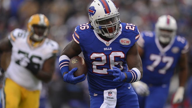Buffalo Bills running back Anthony Dixon (26) breaks away for a run against the Green Bay Packers during Sunday's game at Ralph Wilson Stadium in Orchard Park, New York.