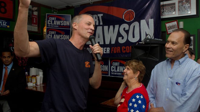 
U.S. Rep. Curt Clawson thanks supporters Tuesday after winning the District 19 congressional seat during a rally at Doc's Beach House in Bonita Springs. 

