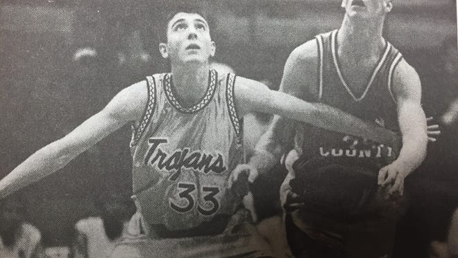 Union County's Clint Sheffer prepared to box out Webster County's Jon Newton during a game in 1999.
