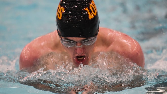 Will Morgan, shown competing in a race last season, swam on two winning relay teams Thursday for the Lobos in a win over cross-town rival Poudre at Edora Pool Ice Center.