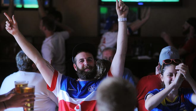 Justin Vanden Bosch of Sioux Falls cheers after the first U.S. goal while watching the Women's World Cup Final between the U.S. and Japan.