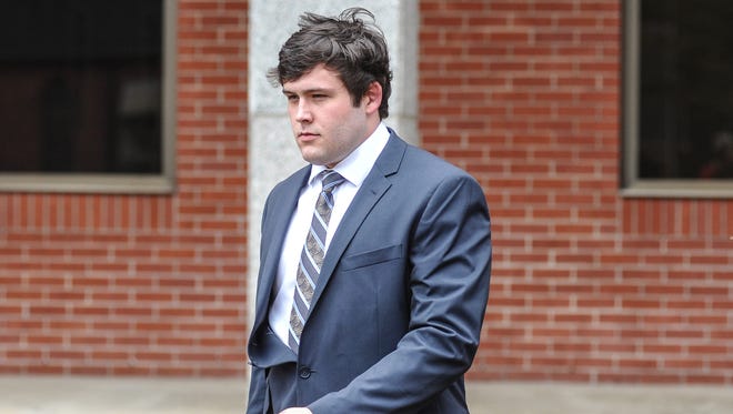 Former University of Mississippi student Austin Reed Edenfield leaves federal court Thursday, March 24, 2016, after pleading guilty to placing a noose on the school's statue of its first black student, in Oxford, Miss. Edenfield waived indictment and pleaded guilty to a misdemeanor charge before U.S. District Judge Michael Mills. The charge says Edenfield helped others threaten force to intimidate African-American students and employees at the university. Edenfield will be sentenced on July 21 and faces up to a year in prison and a $100,000 fine. The government has recommended probation. (Bruce Newman/Oxford Eagle via AP)