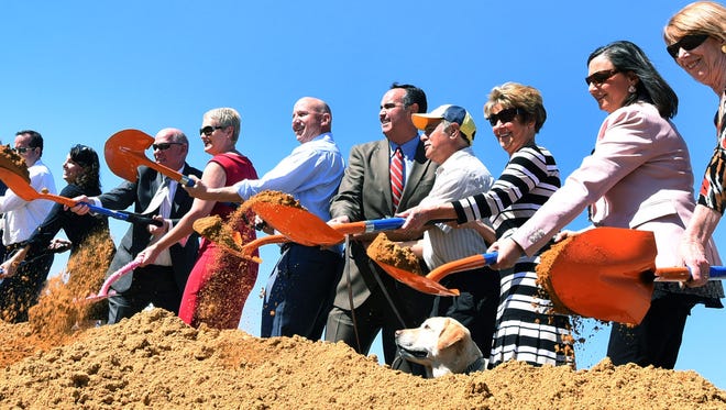 Governor Jack Markell (center) among state and federal officials that took part in a groundbreaking ceremony Wednesday for the new Lewes Transit Center.  The facility  will be located on the southbound side of Coastal Highway just south of Five Points and is expected to become operational next year.