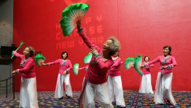 A group of senior dancers from Scarsdale, practice their fan dance in the lobby during the 2017 Chinese New Year festival at Purchase College SUNY, Feb. 25, 2017. 