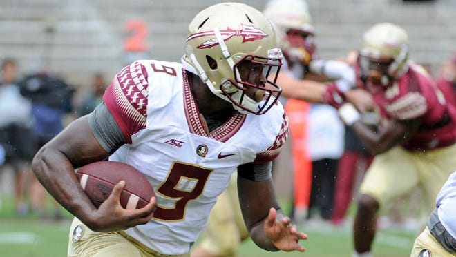 Florida State running back Jacques Patrick (9) runs the ball during the spring game at Doak Campbell Stadium.