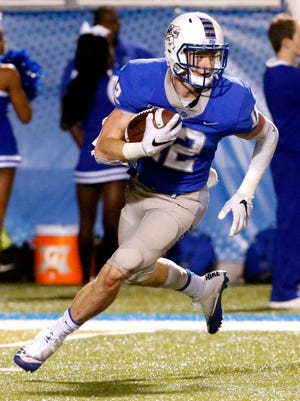 MTSU's Reed Blankenship runs the ball after fielding a punt during a game against UTEP last season.