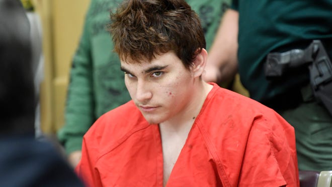 In this April 27, 2018 file photo, Florida school shooting suspect Nikolas Cruz, looks up while in court for a hearing in Fort Lauderdale, Fla.