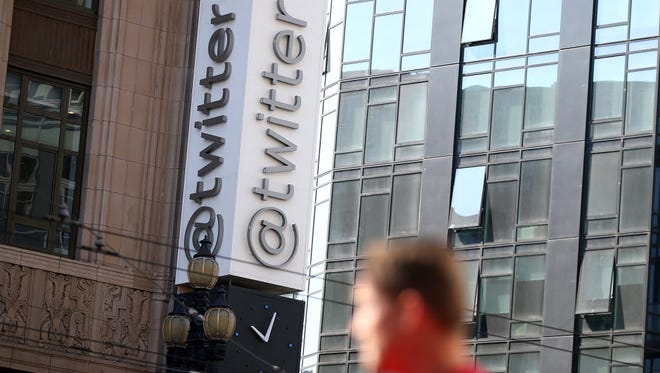 A sign is posted outside of the Twitter headquarters in San Francisco, Calif.