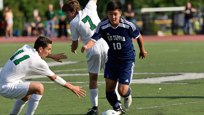 NV/Old Tappan's Joe Moon (10) moves the ball downfield during a game against Pascack Valley in Hillsdale.