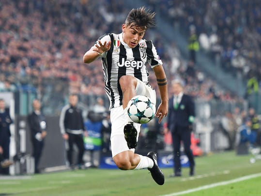 Juventus' Paulo Dybala goes for the ball during the Champions League group D soccer match between Juventus and Sporting, at the Allianz stadium in Turin, Italy, Wednesday, Oct. 18, 2017. (Alessandro Di Marco/ANSA via AP)