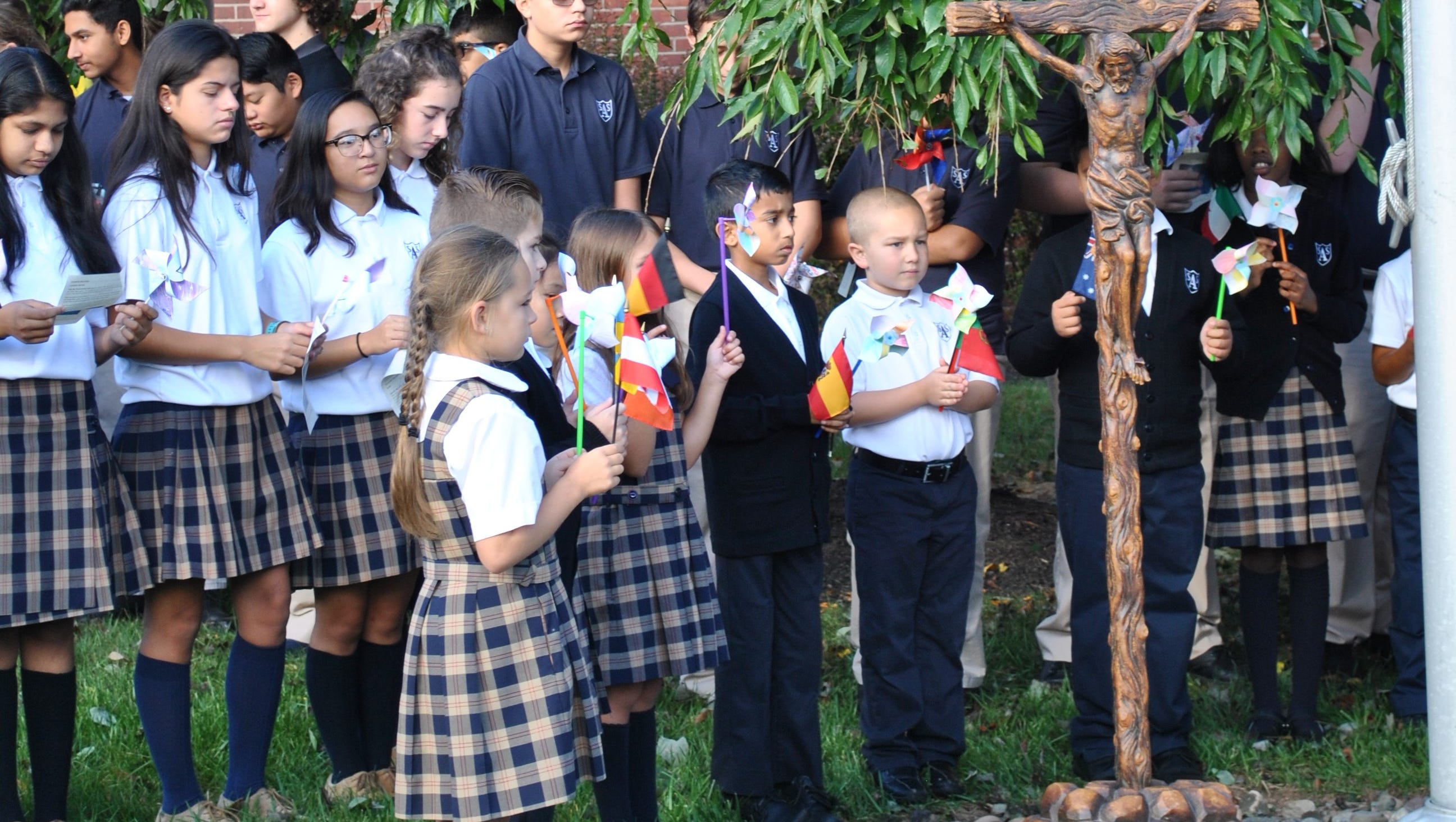Students Plant Pinwheels For Peace