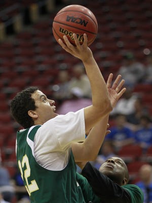Colorado State guard Dorian Green (22) shoots during basketball practice in Louisville, Ky. Wednesday, March 14, 2012 before an NCAA tournament game. The former CSU star has been hired as an assistant coach at the University of Northern Colorado.