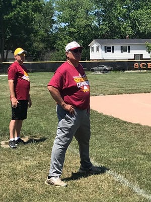 Coach Gandolph watches on as his players participate during some infield drills. Scecina will play Southridge this Saturday at Jasper