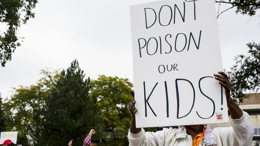 Flint residents protest the water quality in the city Oct. 5, 2015, outside City Hall in Flint, Mich.